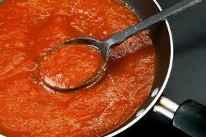 simmer spaghetti sauce covered or uncovered